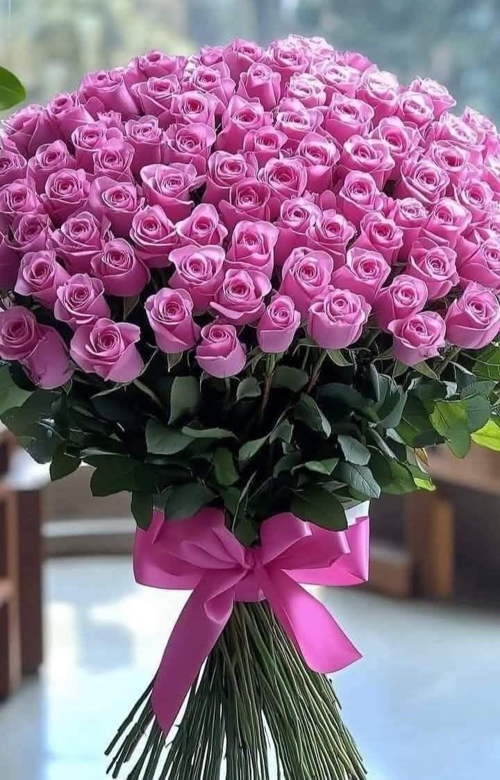 Corporate meeting room with carefully timed floral arrangements that maintain elegance throughout business hours